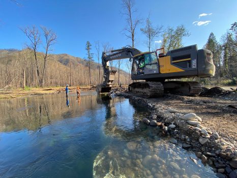 Contractors work to remove water diversion infrastructure as Phase I of restoration wraps up in August 2021.